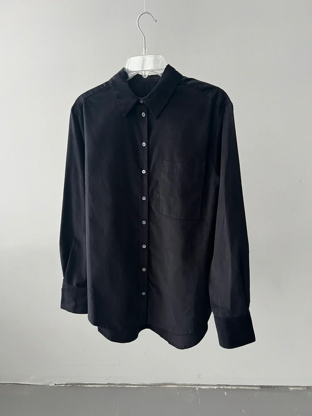 Original hanger photo of the black shirt